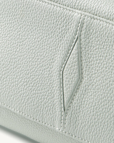 Yore Toast Bag: Light gray full-grain leather with textured grain and stitched detailing.