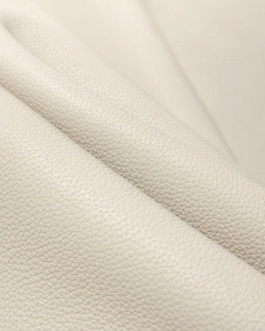 Yore Toast Bag in Cloud color: Soft, tumbled full-grain leather with a natural grain texture.