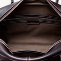 Ebony Yore Toast Bag interior showing fabric lining and zippered pockets, detailed stitching.
