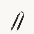 Yore Tote Bag Shoulder Strap in onyx, featuring a black fabric strap with a black and grey zigzag pattern and gold hardware.